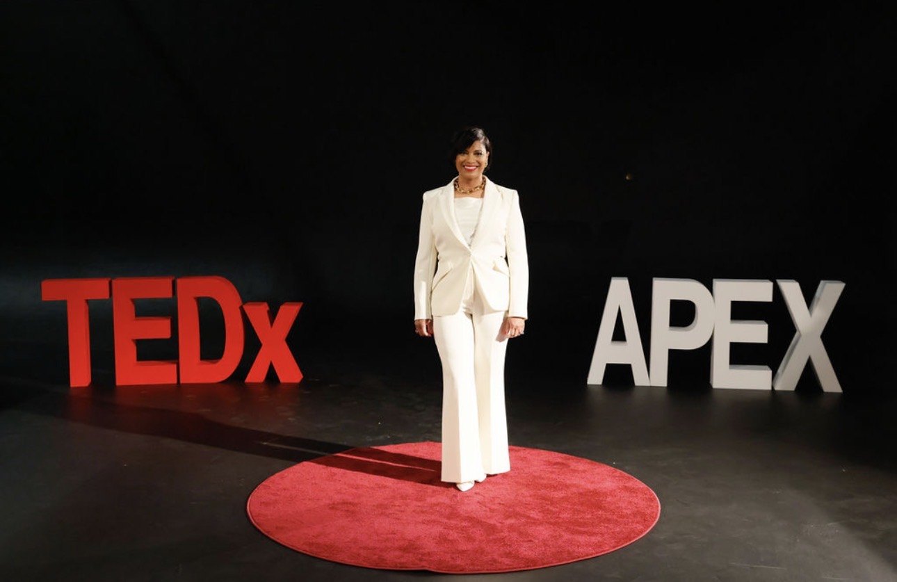 Tammie Ross on the TEDx Apex stage